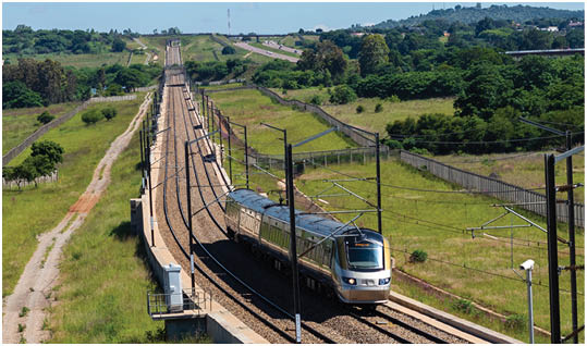 Gautrain, high speed train traveling from Pretoria to Sandton going past Solomon Mahlangu drive, Gauteng, South Africa.