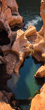 A view looking down on the the plunge pools at Bourke’s Luck Potholes in Mpumalanga, South Africa; a geological formation carved out by the movement of water
