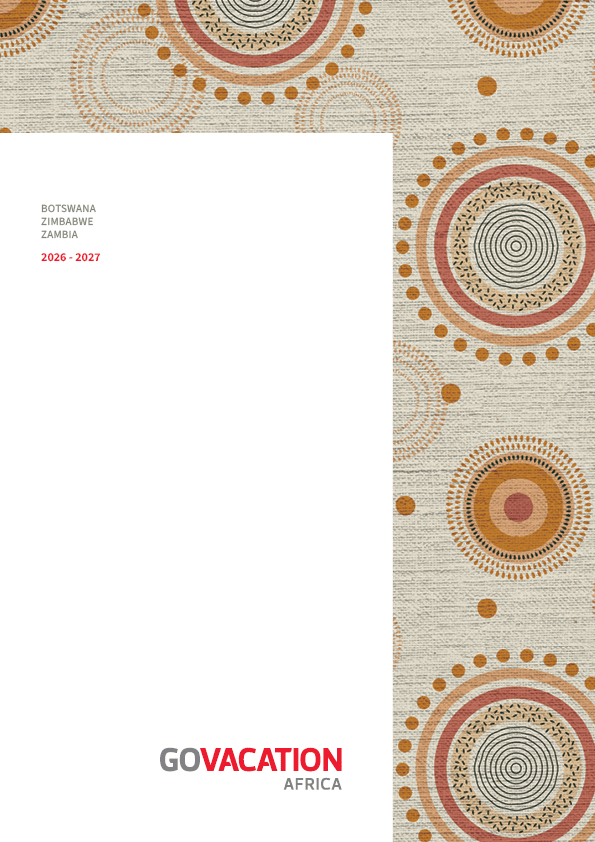 A white and red book with the title “Go Vacation Africa". Description generated by AI
