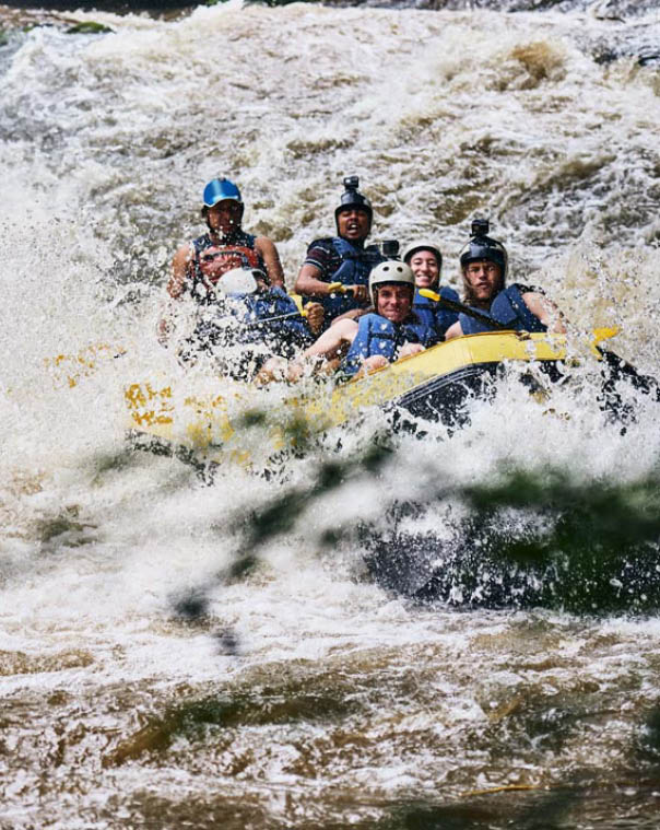 Raft, river and people in boat with speed for fun adventure, holiday and outdoor vacation with friends. Extreme sports, travel and group in water for canoeing, kayaking and rowing activity in lake.