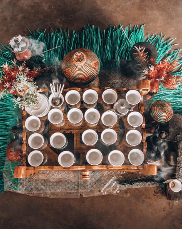 place with cups of Ethiopian coffee served with aromatic essence. Frankincense and myrrh ignited by a hot coal to produce smoke that carries away any bad spirits. Ethiopia, Africa