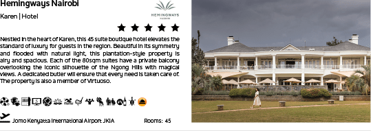 A large white house with a green roof. Description generated by AI