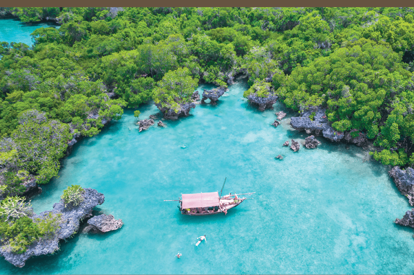 A small boat is floating on a body of water. Description generated by AI