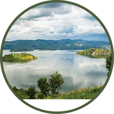 A beautiful view of a lake with mountains in the background. AI generated content