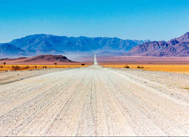 Gravel road in Namibia - panorama - Africa