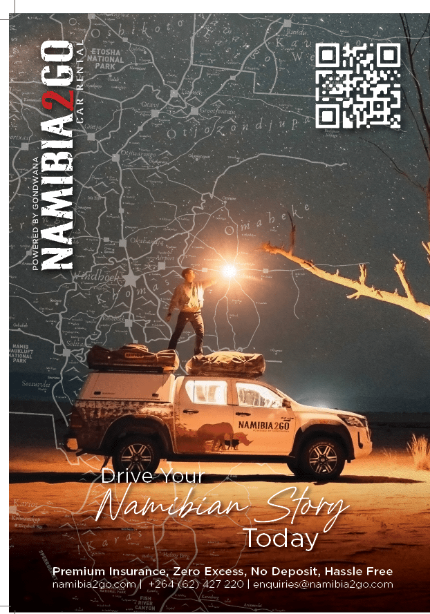 A man is standing on top of a vehicle in Namibia. AI generated content