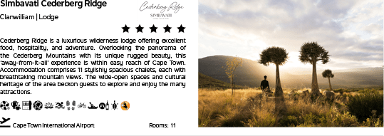 A picture of a lodge with a sunset in the background. Description generated by AI