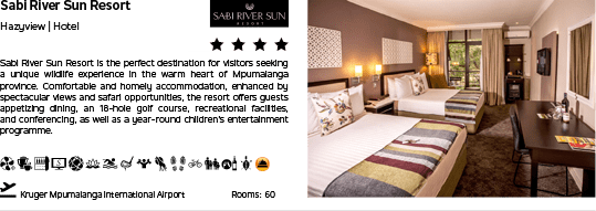A hotel room with a bed and a chair. Description generated by AI
