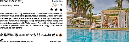 A pool with a woman in a bikini sitting on a lounge chair. Description generated by AI