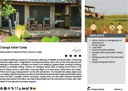 A picture of a safari camp with a group of people. Description generated by AI